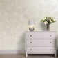 Silver Sand decorative paint in Blanca S1 shade with a wind-blown sand textured pearlescent finish on a wall