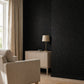 Deep black glitter decorative paint accent wall in a modern living room