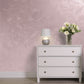 Silver Sand decorative paint in Claret 2 shade with a wind-blown sand textured pearlescent finish on a wall